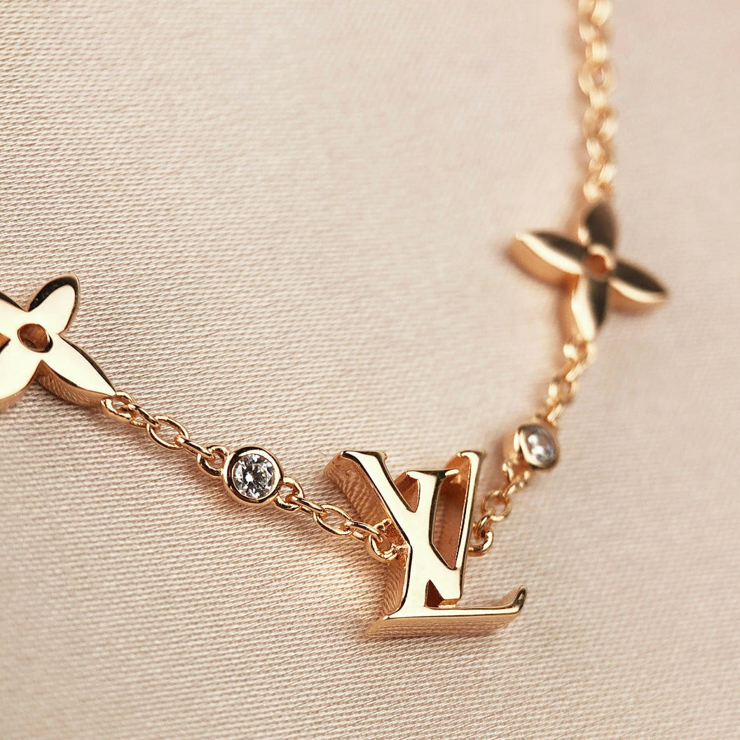 [Auream]STAR AND SUN 7 MOTIFS GOLD BRACELET