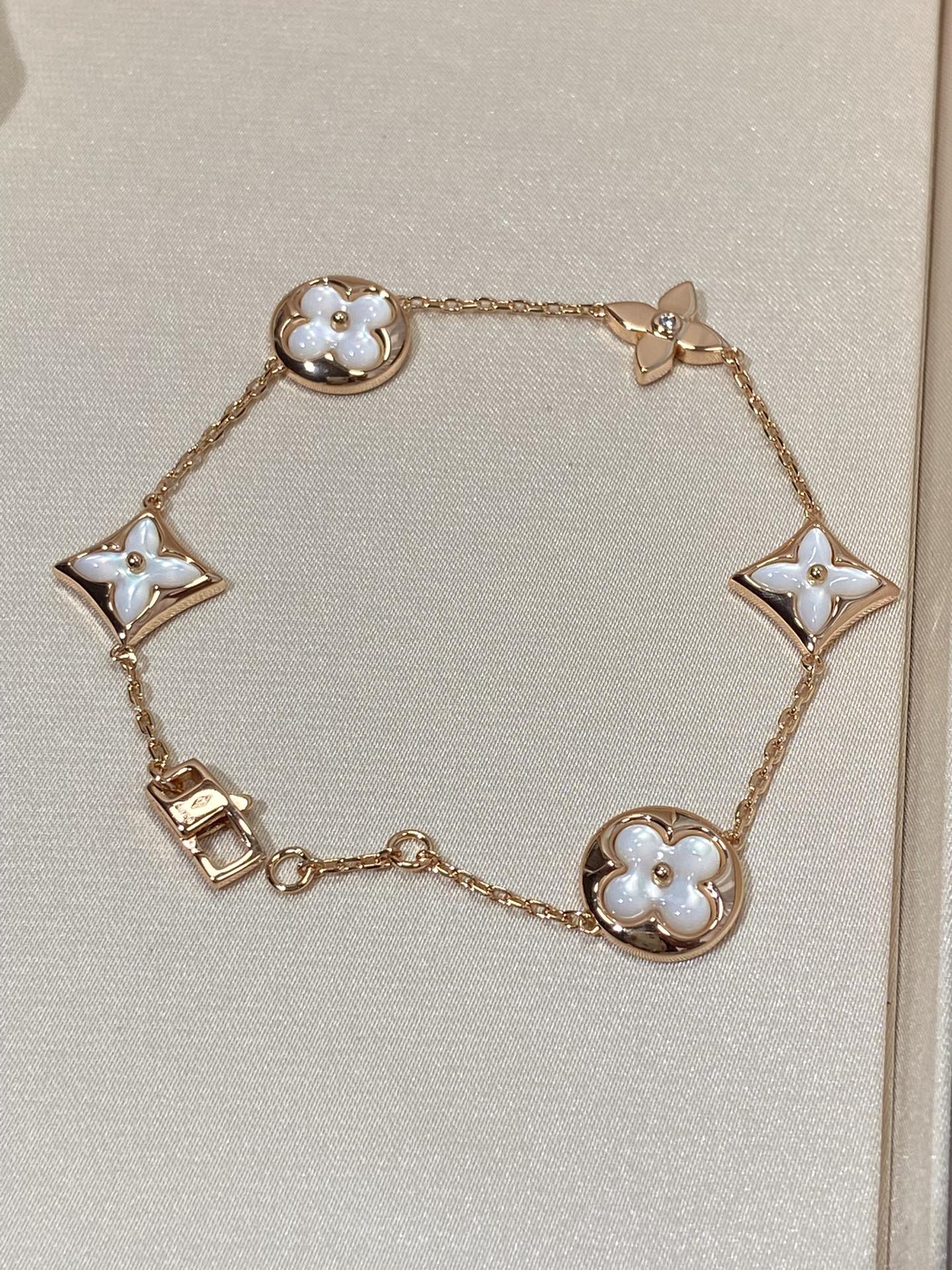 [Auream]STAR AND SUN 5 MOTIF MOP PINK GOLD BRACELET