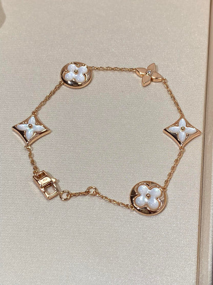 [Auream]STAR AND SUN 5 MOTIF MOP PINK GOLD BRACELET