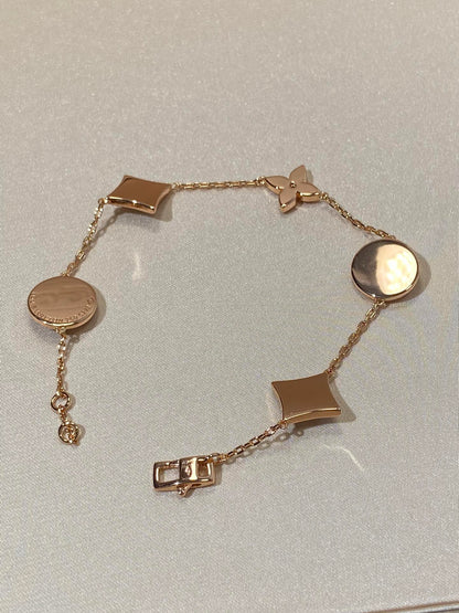 [Auream]STAR AND SUN 5 MOTIF MOP PINK GOLD BRACELET
