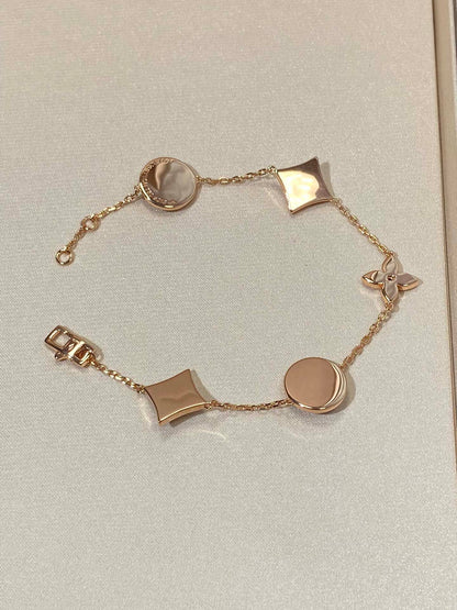 [Auream]STAR AND SUN 5 MOTIF MOP PINK GOLD BRACELET