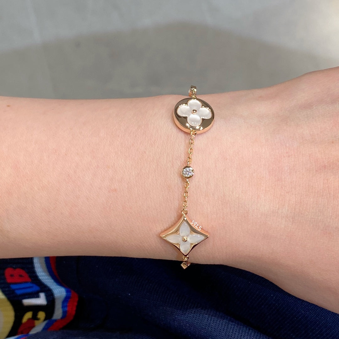 [Auream]STAR AND SUN 4 MOTIF WHITE MOP PINK GOLD BRACELET