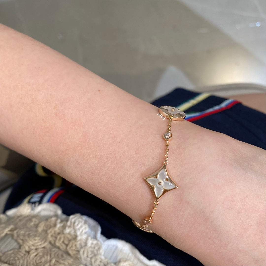 [Auream]STAR AND SUN 4 MOTIF WHITE MOP PINK GOLD BRACELET